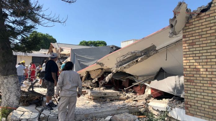 Members of a rescue team and people work at a site where a church roof collapsed during Sunday mass in Ciudad Madero, in Tamaulipas state, Mexico in this handout picture distributed to Reuters on October 1, 2023. Secretaria de Seguridad Publica Tamaulipas/Handout via REUTERS