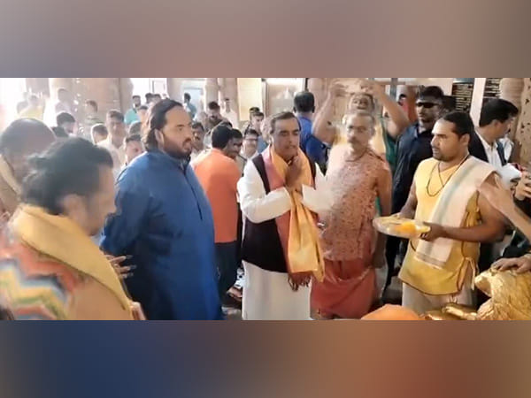 Mukesh Ambani with son Anant Ambani offers prayers at Dwarkadhish Temple in Gujarat