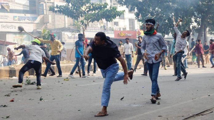 Supporters of Bangladesh Nationalist Party (BNP) throw brickbats towards police during a clash in Dhaka, Bangladesh, on 28 October 2023 | Reuters/Mohammad Ponir Hossain