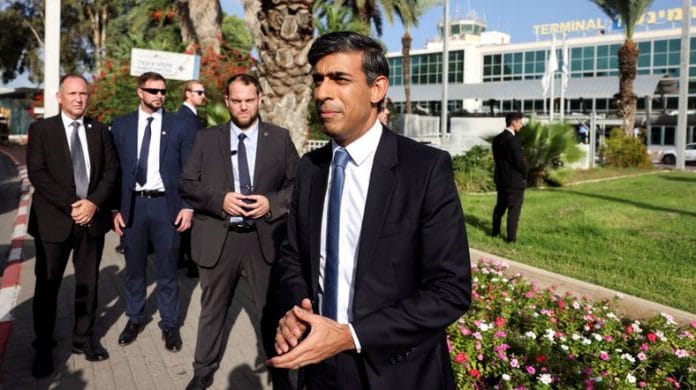 British PM Rishi Sunak speaks to the media after landing at Ben Gurion international airport in Lod, Near Tel Aviv, Israel | Reuters