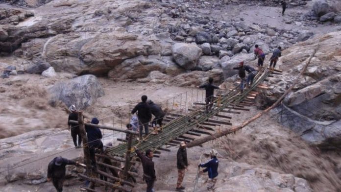 Civilians being rescued via a ropeway made by Indo Tibetan Border Police (ITBP) team at Chungtham, North Sikkim | Photo by special arrangement