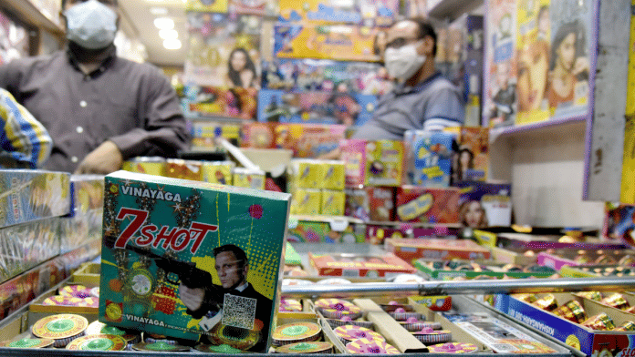 File photo of people buying green crackers ahead of Diwali festival in Delhi | ANI
