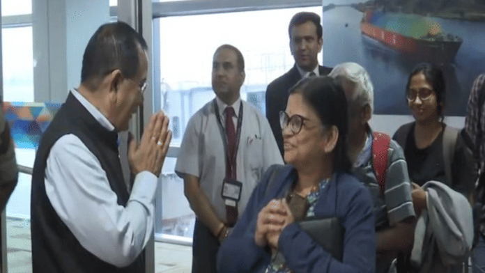 Union Minister of State for External Affairs Rajkumar Ranjan Singh welcomes Indian nationals at Delhi airport (Photo/ANI)
