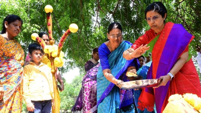 Nara Bhuvaneswari offering prayers at a local temple at Naravaripalle ahead of her yatra | By special arrangement