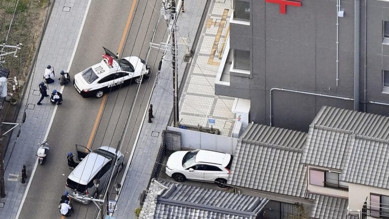 Suspected gunman in Japan takes hostages in post office after hospital shooting