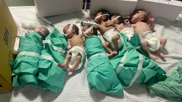 Newborns are placed in bed after being taken off incubators in Gaza's Al Shifa hospital after power outage, amid the ongoing conflict between Israel and the Palestinian Islamist group Hamas, in Gaza City, Gaza | Reuters