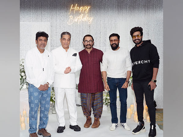Aamir Khan, Suriya pose at Kamal Haasan's birthday bash