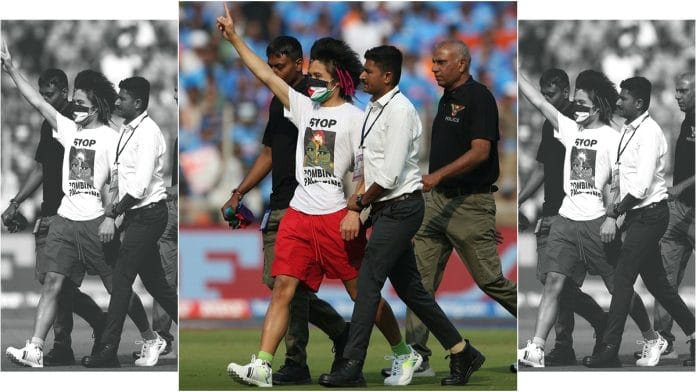 Officials escorting Australian citizen out of Narendra Modi stadium in Ahmedabad during World Cup final, Sunday