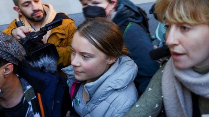 Climate activist Greta Thunberg walks outside Westminster Magistrates' Court in London, on 15 Nov 2023 | Reuters