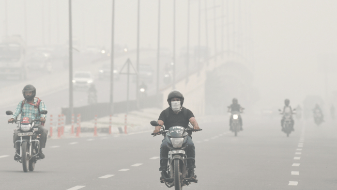 Vehicles ply on the NH-9 amid a thick layer of smog as Delhi's air quality remains 'very poor' on Saturday | ANI/Shrikant Singh