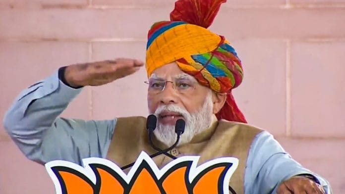 PM Narendra Modi speaks during a public meeting ahead of Rajasthan Assembly elections, in Kota, on 21 Nov 2023 | PTI File Photo