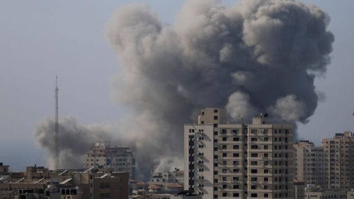Smoke rises after Israeli strikes, amid the ongoing conflict between Israel and Palestinian Islamist group Hamas, in Gaza City on Monday | REUTERS/Mohammed Al-Masri