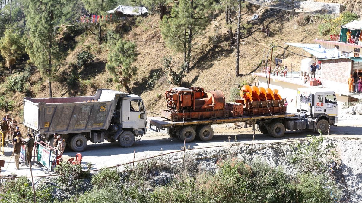 An augur machine is brought in } Photo: Suraj Singh Bisht/ThePrint