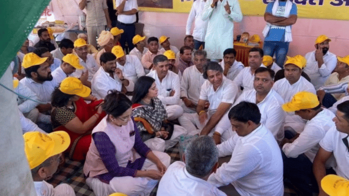 Congress leader Kiran Choudhry (pink jacket) with her daughter Shruti Choudhry at protest site of Sanyukt Ahir Regiment Morcha in Gurugram | By Special Arrangement