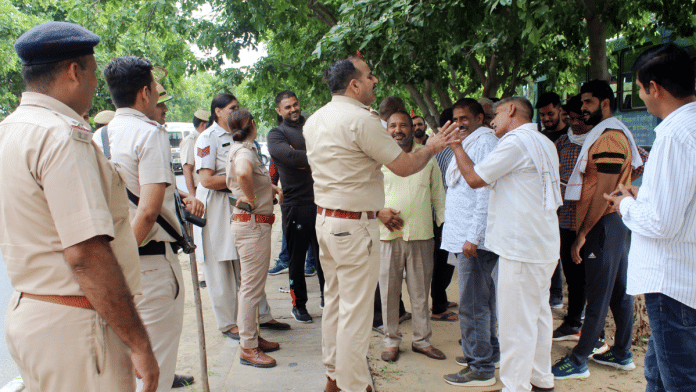 File photo of Haryana Police personnel trying to placate protesters | ANI