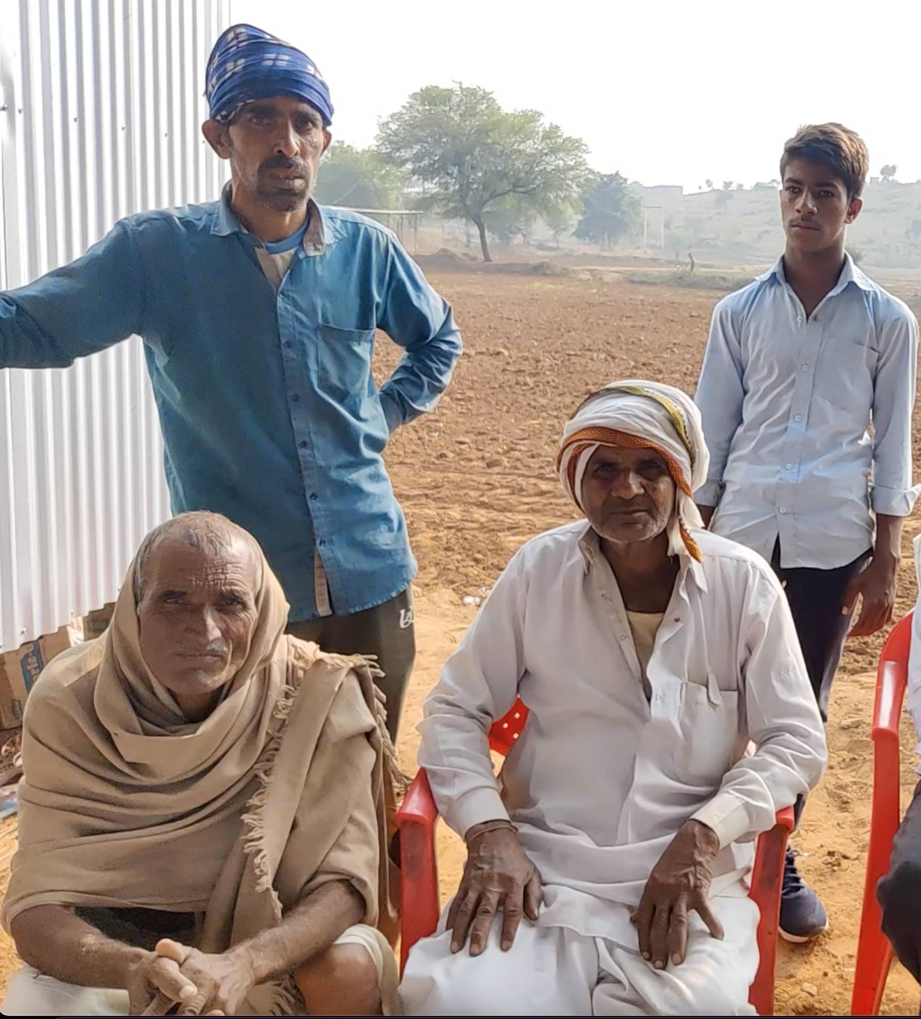 Farmers gather at a tea stall and discuss elections in Thanagazi's Angari village | Photo: Amogh Rohmetra| ThePrint
