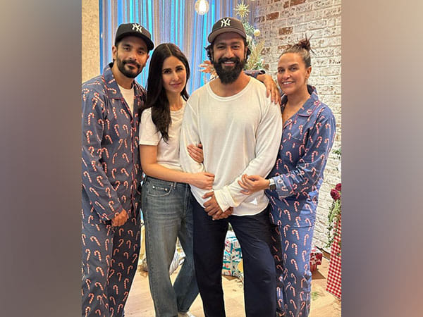 Vicky, Katrina pose with Neha Dhupia, Angad Bedi at Christmas bash