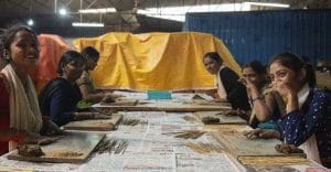 Women roll incense sticks at a Phool production unit in Kanpur | Photo: Mohana Basu, ThePrint