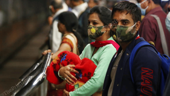A mother with her infant child at a Delhi Metro station | Representational image | Suraj Singh Bisht