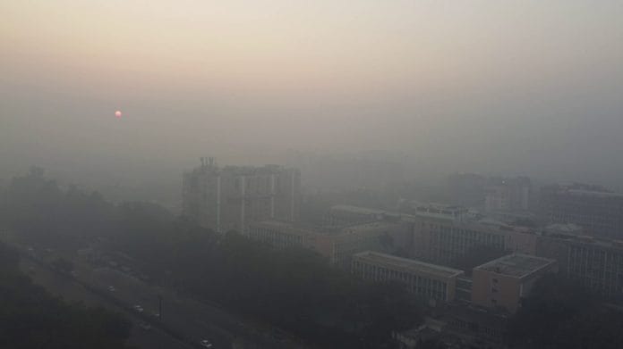 A drone visual of an area after a layer of fog covers the National Capital as the cold wave grips the city, in New Delhi on Sunday, 24 December | ANI