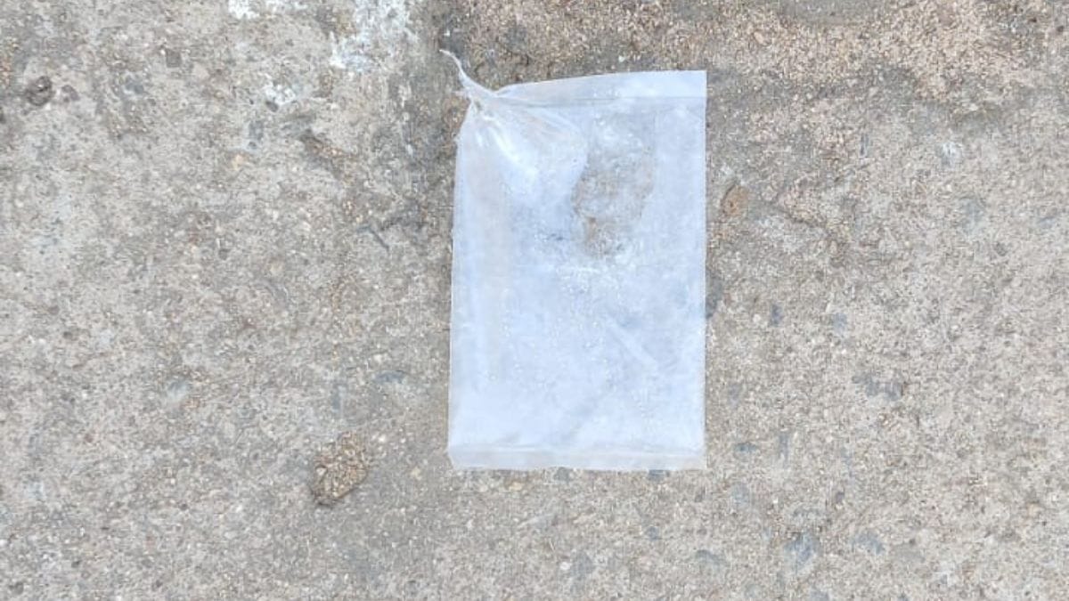 A discarded 180 ml pouch of country liquor outside a manufacturing plant in Balangir | Photo: Mayank Kumar/ThePrint