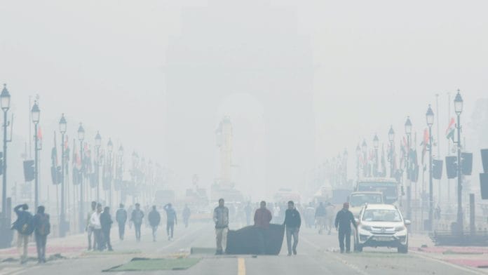 Commuters ply amid the dense fog on a cold morning at Kartavya Path, in New Delhi on Monday | ANI
