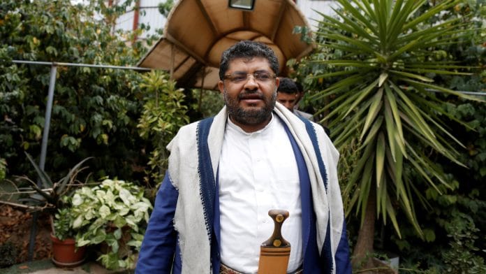 Mohamed Ali al-Houthi, head of the Houthi supreme revolutionary committee, walks after an interview with Reuters in Sanaa, Yemen | Reuters