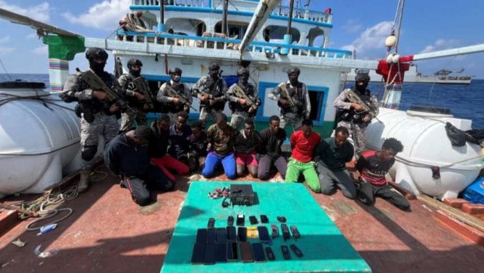 Indian Navy with detained pirates | By special arrangement