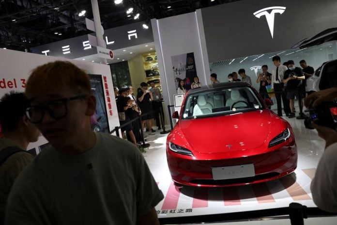 Tesla delivers record Q4 cars, but China's BYD steals top EV spot ...