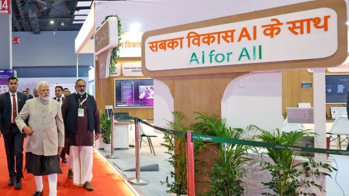 PM Modi walks through an exhibition at the Global Partnership on Artificial Intelligence Summit in December 2023. | ANI