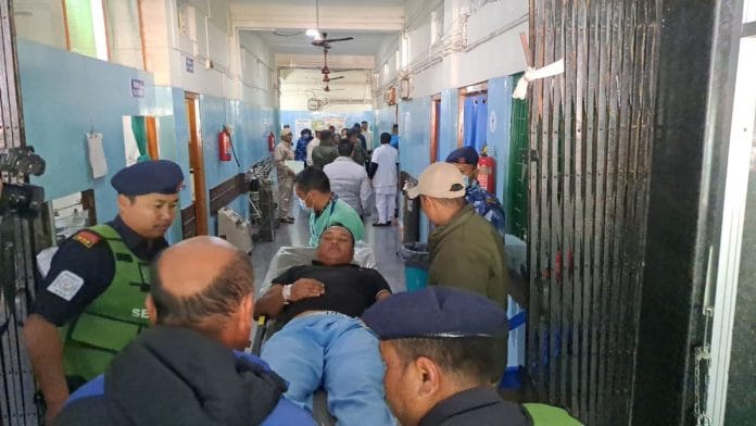 The injured being taken to hospital | By special arrangement