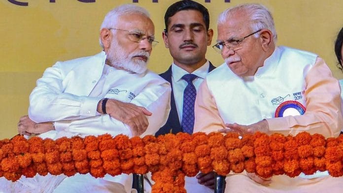 File photo: PM Modi with Manohar Lal Khattar | PTI