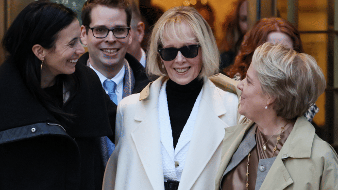 Columnist E. Jean Carroll (centre) and her attorneys react outside the Manhattan Federal Court, after the verdict in the second civil trial after she accused former U.S. President Donald Trump of raping her decades ago, in New York City | Reuters
