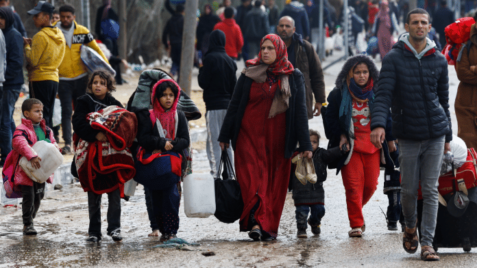 Palestinians fleeing Khan Younis, due to the Israeli ground operation, move towards Rafah, amid the ongoing conflict between Israel and the Palestinian Islamist group Hamas, in the southern Gaza Strip, January 29, 2024 | Reuters