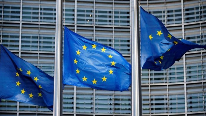 European Union flags fly outside the European Commission headquarters in Brussels, Belgium | Reuters
