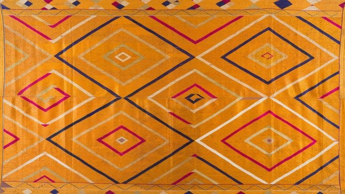 Vari Da Bagh with large colourful diamonds and smaller all-over self-design diamond pattern, Undivided Punjab, India, c. 1930s, Cotton, floss silk, 118 x 234 cm | Image courtesy of Museum of Art & Photography (MAP), Bengaluru.
