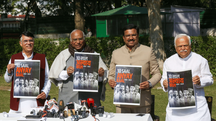 Congress president Mallikarjun Kharge (second frome left) releases 'Black Paper' against the Modi government during a press conference, in New Delhi on Thursday | Suraj Singh Bisht | ThePrint
