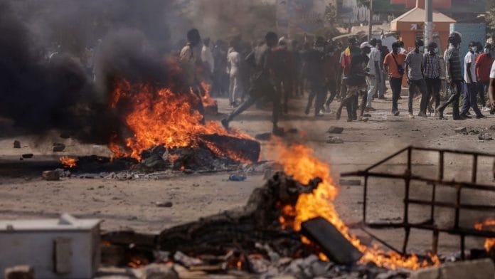 Senegalese demonstrators protest against the postponement of the Feb. 25 presidential election, in Dakar, Senegal February 9, 2024 | Reuters/Zohra Bensemra