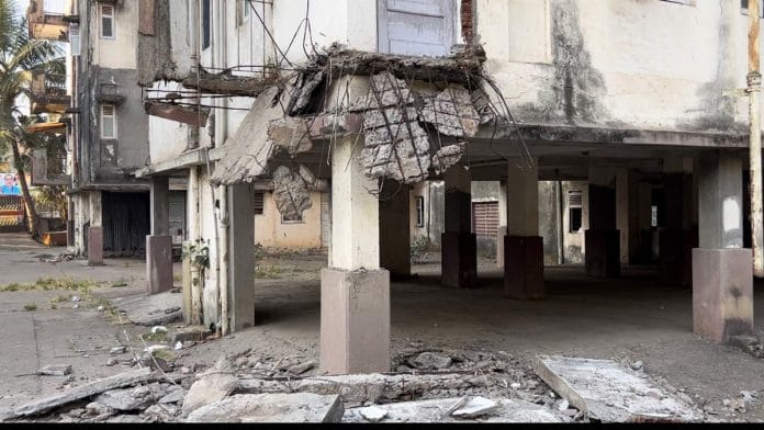 The balcony of a vacant building in Mumbai's Air India Colony was demolished on 24 January by a team from Mumbai International Airport Limited (MIAL). Residents managed to stop the demolition, but time is running out for them | Photo: Manasi Phadke | ThePrint