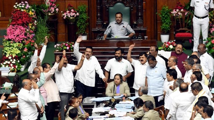 Bharatiya Janata Party (BJP) MLAs stage a protest against the government in the Karnataka legislative assembly, in Bengaluru on Friday, 23 February 2024 | ANI