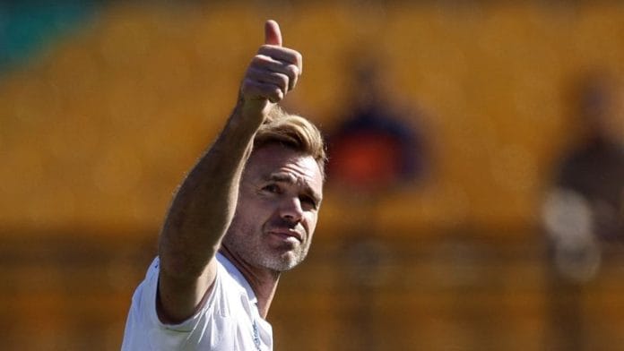 James Anderson acknowledges the crowd after taking his 700th Test wicket following the dismissal of India's Kuldeep Yadav, caught out by Ben Foakes REUTERS/Adnan Abidi