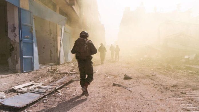 Israeli soldiers operate in the Gaza Strip amid the ongoing conflict between Israel and the Palestinian Islamist group Hamas, in this handout picture released on March 5, 2024. Israel Defense Forces/Handout via REUTERS Israel Defense Forces/Handout via REUTERS