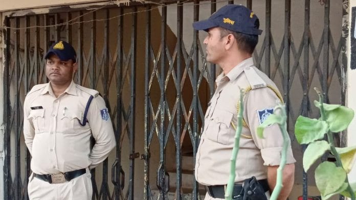 Police stand guard outside site of murder in Jabapur | Photo: special arrangement