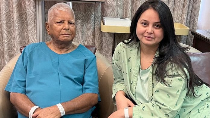 File photo of RJD chief Lalu Prasad Yadav with daughter Rohini Acharya | ANI