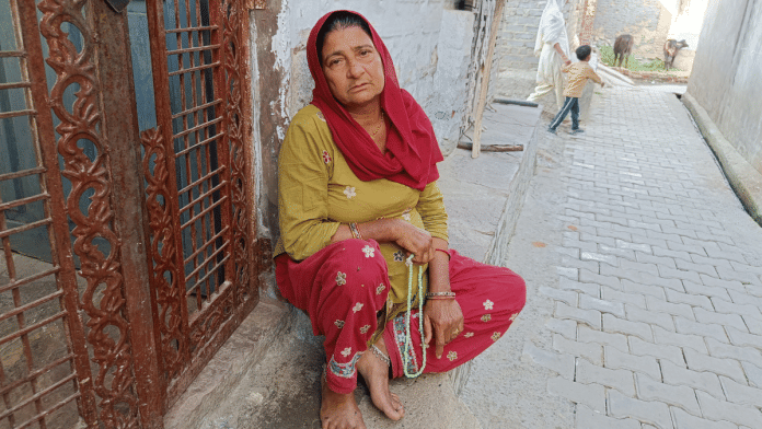 Shamshu sits outside her housing in Khajuri Odpur, Kota, waiting for her grandson Lucky Ali to return | Krishan Murari | ThePrint