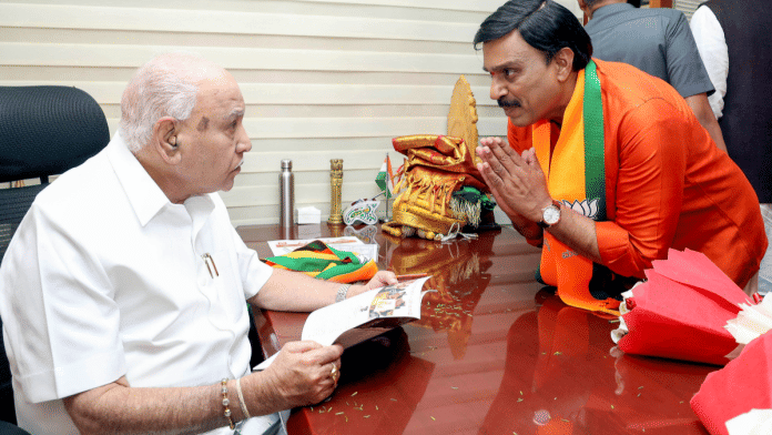 Karnataka Rajya Pragathi Paksha (KRPP) MLA Gali Janardhana Reddy greets the BJP leader and former Karnataka CM B.S. Yediyurappa after he joined the BJP in Bengaluru | ANI