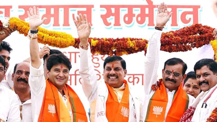 Union Minister for Civil Aviation and BJP candidate from Guna Lok Sabha seat, Jyotiraditya Scindia with Madhya Pradesh Chief Minister Mohan Yadav and BJP State President V.D. Sharma being at the Yadav Samaj Sammelan, at Chanderi, in Ashoknagar | Photo: ANI