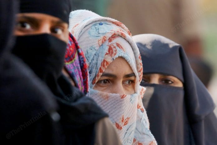 Muslim women stand in queue at the polling booth | Photo: Praveen Jain | ThePrint