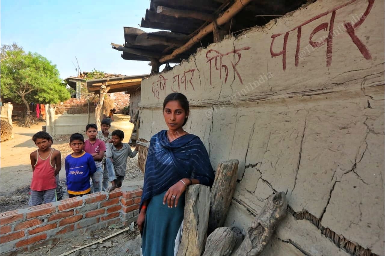 Slogans on the walls in Bardiya village. | Photo: Praveen Jain | ThePrint