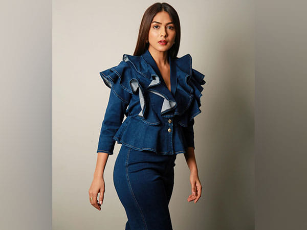Mrunal Thakur stuns in ruffled top and denim combo